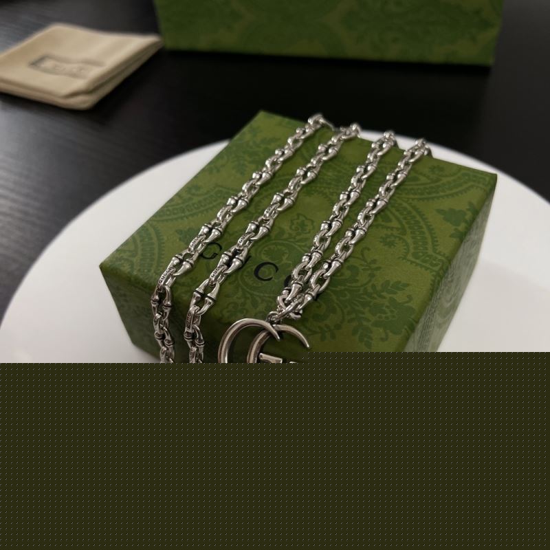 G*u*i necklaces